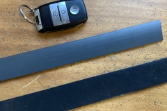 Test extrusions.  Light grey is 50% pipe regrind with 50% recycled PVC (pellets).  Dark grey is 100% recycled PVC (pellets)